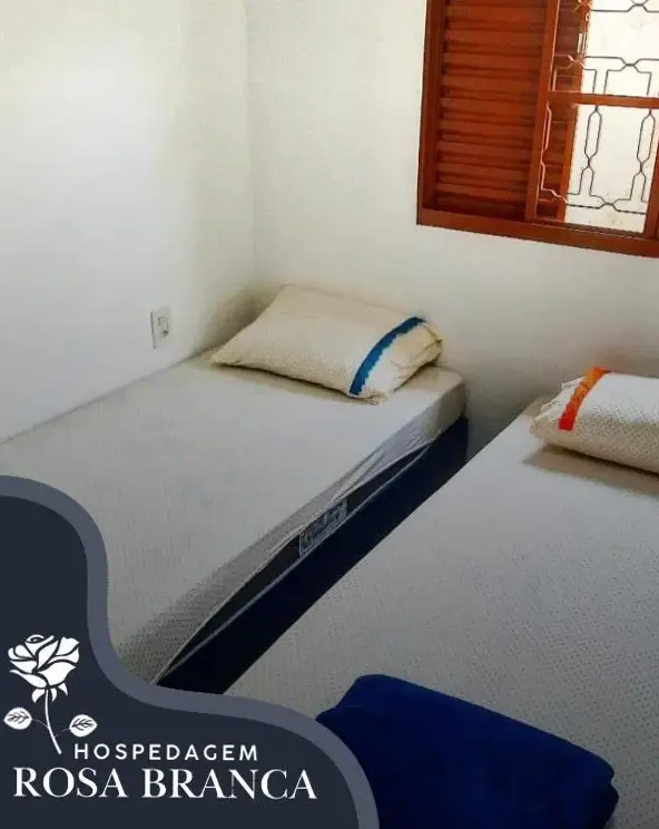 Hospedagem Rosa Branca