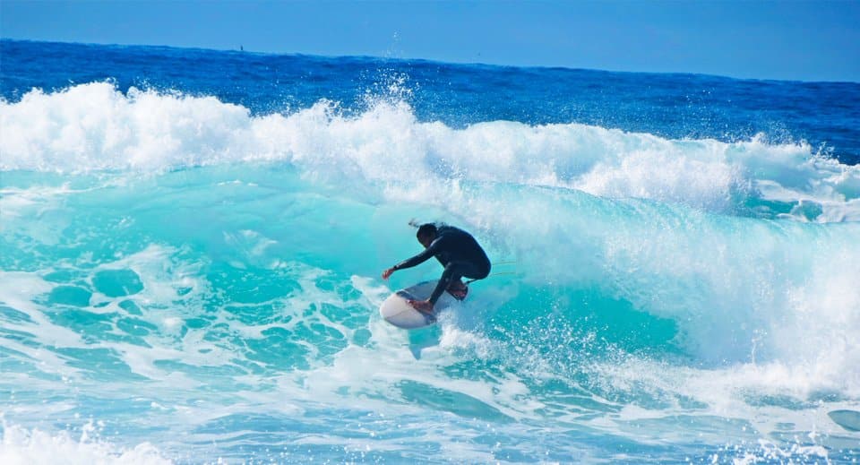 Surfista na Praia do Mole, em Florianópolis