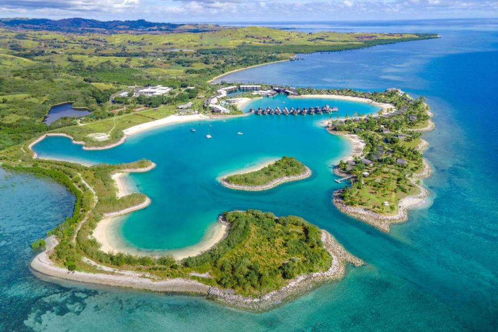 Resort em Fiji, lagoa e mar visto de cima