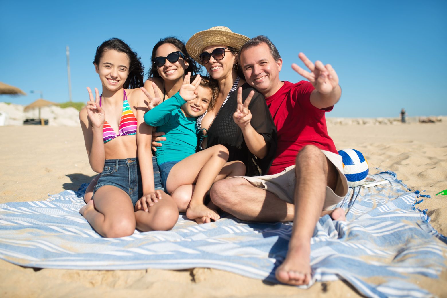 Família na praia banco de imagens